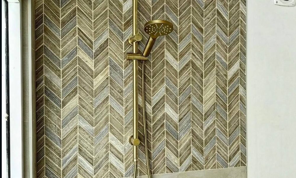 luxury-chevron-tile-shower-gold-rainhead