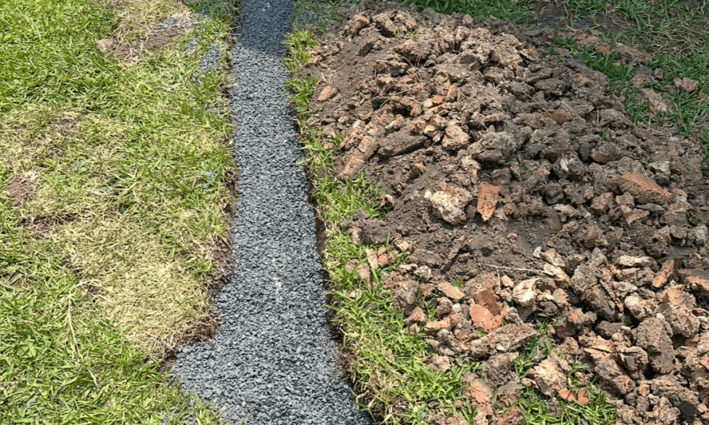 surface-water-drainage-trench-turf-gravel-backfill